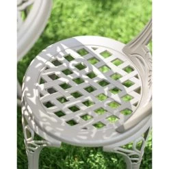 Deluxe "Rosenbloom" Two Seater Garden Table & Chair Set In Champagne -Garden Supply Discount Store lattice work close shot 1