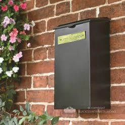 Medium "Pevensey Square” Newspaper And Parcel Holder -Garden Supply Discount Store newspaper and parcel holder in black with brass plaque