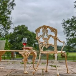 'Alvera' Rustic Cream Cast Iron Victorian Chair -Garden Supply Discount Store rustic cream cast iron victorian chair 3