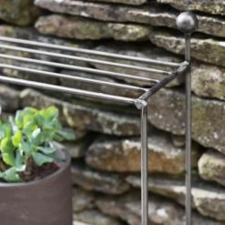 Simplistic Steel Plant Shelving Stand -Garden Supply Discount Store simplistic steel plant shelving stand